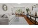 Open living room featuring hardwood floors, neutral colors, and views to the outside at 1317 White Dr, Charleston, SC 29407