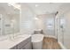 Bright bathroom features a soaking tub, dual vanities, stand up shower and modern fixtures at 1502 Menhaden Ln, Mount Pleasant, SC 29466