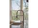 Close-up of the kitchen faucet with spring and windows in the background at 1502 Menhaden Ln, Mount Pleasant, SC 29466