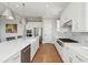 Gourmet kitchen featuring a center island, stainless steel appliances, and modern finishes at 1502 Menhaden Ln, Mount Pleasant, SC 29466