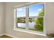 A picturesque view of the neighborhood pond is seen from this property's bright window at 151 Tyger St, Summerville, SC 29485