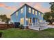 View of the backyard with a wooden fence and a well-kept lawn at 1511 Hopkins Ln, Mount Pleasant, SC 29466