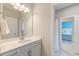 Bathroom with a white vanity, chrome fixtures and view into the bedroom at 1511 Hopkins Ln, Mount Pleasant, SC 29466