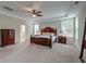 Spacious bedroom with a large bed, elegant furniture, and natural light at 1511 Hopkins Ln, Mount Pleasant, SC 29466