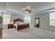 Spacious bedroom with a large bed, elegant furniture, and natural light at 1511 Hopkins Ln, Mount Pleasant, SC 29466