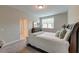 Cozy bedroom with carpet, a ceiling fan, and a sunny window at 1511 Hopkins Ln, Mount Pleasant, SC 29466