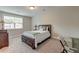 Cozy bedroom with carpet, a ceiling fan, and a sunny window at 1511 Hopkins Ln, Mount Pleasant, SC 29466
