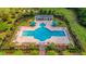 Overhead shot of a neighborhood pool with chairs, umbrellas, and landscaping at 1511 Hopkins Ln, Mount Pleasant, SC 29466