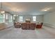 Spacious living room with plush seating, carpet floors, a tv, and windows for ample natural light at 1511 Hopkins Ln, Mount Pleasant, SC 29466