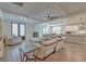 Open living space with a fireplace, cozy seating, and seamless flow into the kitchen and dining area at 1511 Hopkins Ln, Mount Pleasant, SC 29466