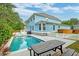 Backyard view with an in-ground pool and a wooden fence at 1511 Hopkins Ln, Mount Pleasant, SC 29466