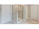 Bathroom shower with a glass door and tile surround at 1511 Hopkins Ln, Mount Pleasant, SC 29466