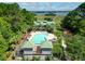 Overhead view of community pool area with lounging and dining areas at 1518 Bower Ln, Johns Island, SC 29455