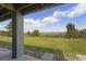 Scenic backyard view with lush green lawn and a clear blue sky at 1518 Bower Ln, Johns Island, SC 29455