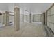 Spacious unfinished basement area with concrete pillars and floors with light streaming in at 1518 Bower Ln, Johns Island, SC 29455