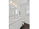 Elegant bathroom featuring a marble countertop, a large mirror, and modern fixtures in a bright, clean design at 1518 Bower Ln, Johns Island, SC 29455