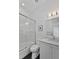 Clean bathroom featuring a glass enclosed shower, toilet and modern sink with vanity at 1518 Bower Ln, Johns Island, SC 29455