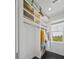Bright walk-in closet with shelving and window providing natural light to the space at 1518 Bower Ln, Johns Island, SC 29455