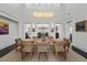 Elegant dining room with high ceilings, natural light, and open floor plan features at 1518 Bower Ln, Johns Island, SC 29455