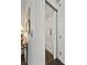 Residential elevator with white interior, safety bar, and user-friendly control panel at 1518 Bower Ln, Johns Island, SC 29455