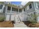 Welcoming staircase leading to a charming porch for enjoying waterfront views at 1518 Bower Ln, Johns Island, SC 29455