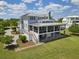 Expansive waterfront home with generous lot, mature trees, and serene views of the water at 1518 Bower Ln, Johns Island, SC 29455