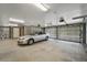 Spacious garage with ample room for parking and storage, featuring car and automatic garage doors at 1518 Bower Ln, Johns Island, SC 29455