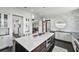 Gourmet kitchen features marble island, custom cabinetry, and stainless steel appliances at 1518 Bower Ln, Johns Island, SC 29455