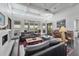 Bright living room with water views, fireplace, stylish furniture, and elegant decor at 1518 Bower Ln, Johns Island, SC 29455