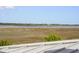 Breathtaking marsh view overlooking tranquil waters and beautiful trees and foliage at 1518 Bower Ln, Johns Island, SC 29455