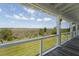 An outdoor porch showcases views of the marsh and backyard at 1518 Bower Ln, Johns Island, SC 29455