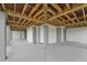View of the underside of the deck with wood construction and concrete pilings at 1518 Bower Ln, Johns Island, SC 29455