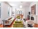 Living room showcases sophisticated decor, fireplace, and a glimpse of an adjacent room at 155 Wentworth St # A, Charleston, SC 29401