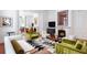 Spacious living room with a decorative fireplace and stylish furnishings, ideal for relaxation and gatherings at 155 Wentworth St # A, Charleston, SC 29401