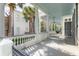 Inviting outdoor space, highlighting the columns and ceiling details at 155 Wentworth St # A, Charleston, SC 29401