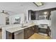 Beautiful kitchen featuring stainless steel appliances and a view into the living area at 157 Tyger St, Summerville, SC 29485