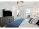 Bedroom featuring a large TV on a dresser and windows with white shutters at 1629 Ware Bottom Ln, Mount Pleasant, SC 29464