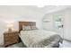 Comfortable bedroom featuring a wooden headboard, bedside table and neutral decor for a relaxing ambiance at 1629 Ware Bottom Ln, Mount Pleasant, SC 29464