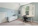 Bright office with a large window and desk at 1629 Ware Bottom Ln, Mount Pleasant, SC 29464