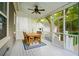 Covered porch with table and chairs at 1629 Ware Bottom Ln, Mount Pleasant, SC 29464