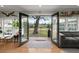 Living room with doors open to the backyard, perfect for indoor-outdoor living at 1673 Mcclain St, Charleston, SC 29407