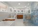A luxurious bathroom featuring a soaking tub, a large vanity, and a glass shower with designer tile at 1673 Mcclain St, Charleston, SC 29407