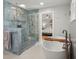 Beautiful bathroom with a soaking tub and an expansive shower with luxurious tile surround at 1673 Mcclain St, Charleston, SC 29407