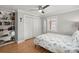 Cozy bedroom with hardwood floors, closet and built in bookcase at 1673 Mcclain St, Charleston, SC 29407