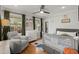 Bright Bedroom with hardwood floors, multiple windows, and modern decor at 1673 Mcclain St, Charleston, SC 29407