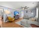 Spacious living room boasts hardwood floors, modern decor, and a comfortable seating area at 1673 Mcclain St, Charleston, SC 29407