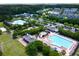 Expansive aerial view of the neighborhood amenities including the pool, playground, and tennis courts at 1678 William Hapton Way, Mount Pleasant, SC 29466