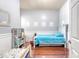Cozy bedroom with two beds, hardwood floors, and stylish decor at 1678 William Hapton Way, Mount Pleasant, SC 29466