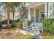 This home has a charming front porch with rocking chairs and an American flag displayed at 1678 William Hapton Way, Mount Pleasant, SC 29466