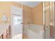 Bright bathroom featuring a large soaking tub, walk-in shower and vanity at 1825 Brittlebush Ln, Johns Island, SC 29455